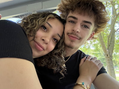 Us wearing matching hoodies